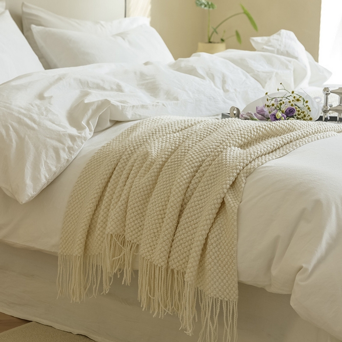 91家纺网 家纺一手货源 找家纺 （总）朴尔家纺-毛巾被 2024年新款波波风流苏柔糯毯床尾毯沙发巾