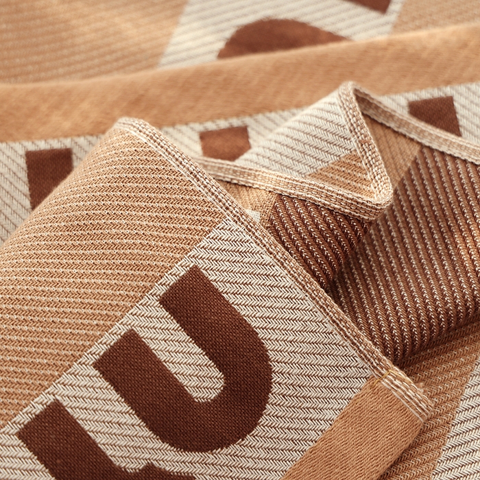 91家纺网 家纺一手货源 找家纺 朴尔毛巾被2024年新品全棉细纱编织纹AB版透气枕巾 字母世界52*78cm