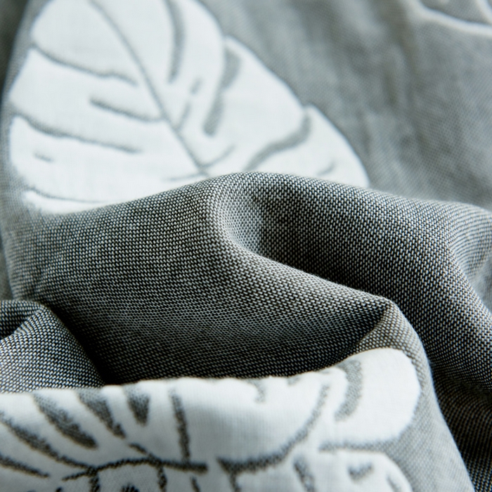 91家纺网 家纺一手货源 找家纺 朴尔2024新款六层纱布全棉循环小花型枕巾50*80cm一对 芭蕉情缘深灰枕巾