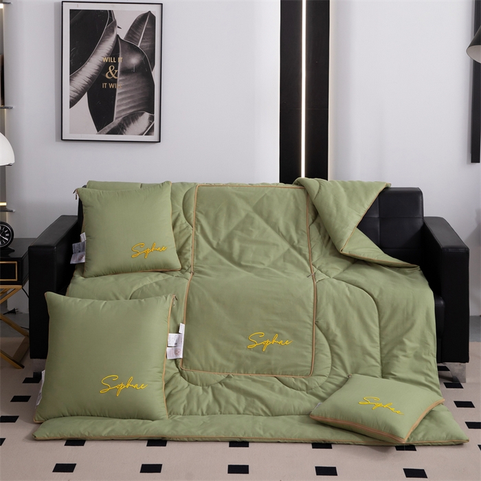 91家纺网 家纺一手货源 找家纺 照世家纺 2024新款时尚简约抗菌棉抱枕被 嫩绿