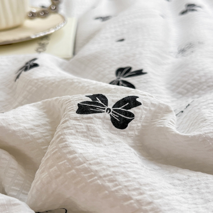 91家纺网 家纺一手货源 找家纺 2024新款泡泡棉小缺角工艺夏被四件套 蝴蝶结