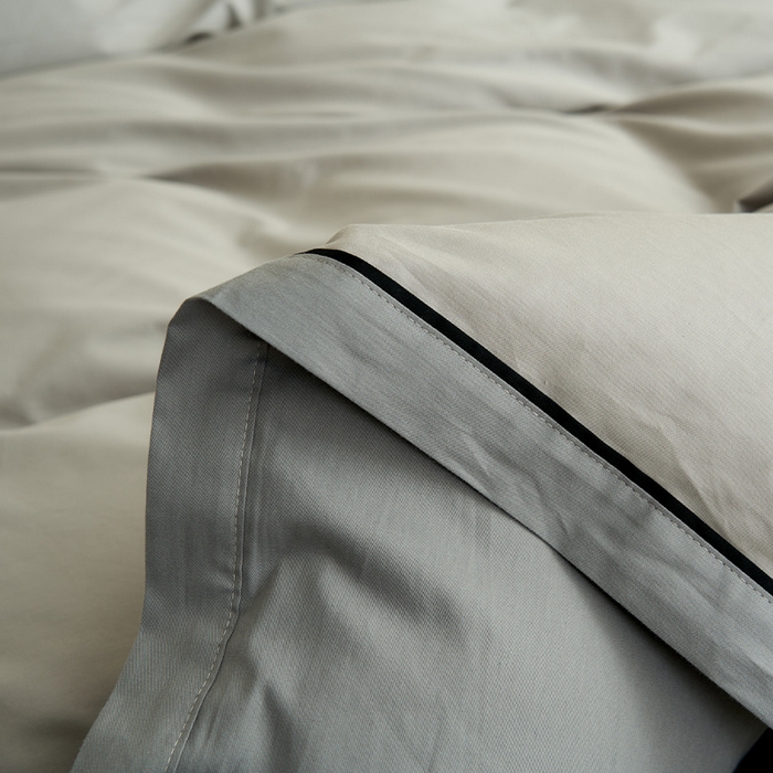 91家纺网 家纺一手货源 找家纺 小懒猪 2024新款全棉斜纹精梳棉双拼色拼角包边款四件套 拼角椰子灰-月岩灰