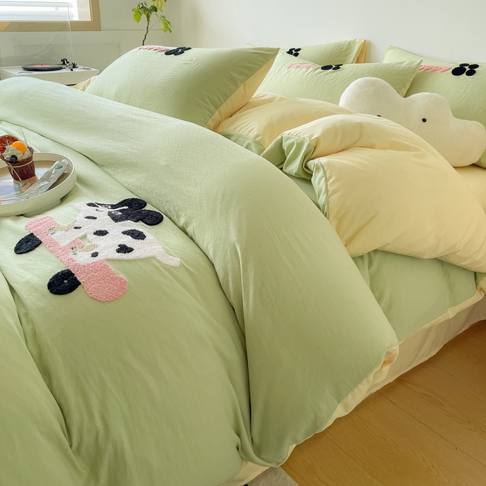 91家纺网 家纺一手货源 找家纺 梵克保罗 2024新款卡通水洗棉毛巾绣四件套 浅绿配米黄