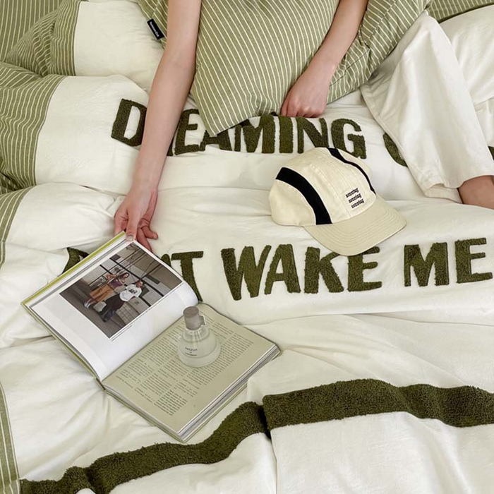 91家纺网 家纺一手货源 找家纺 圆岛家纺 2024新款博主风全棉色织水洗棉拼接毛巾绣四件套 多米绿