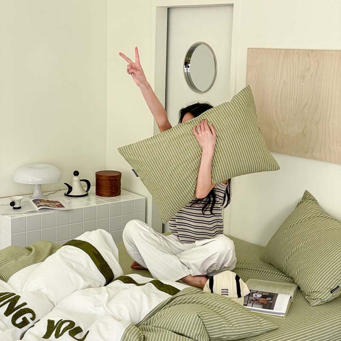 91家纺网 家纺一手货源 找家纺 圆岛家纺 2024新款博主风全棉色织水洗棉拼接毛巾绣四件套 多米绿