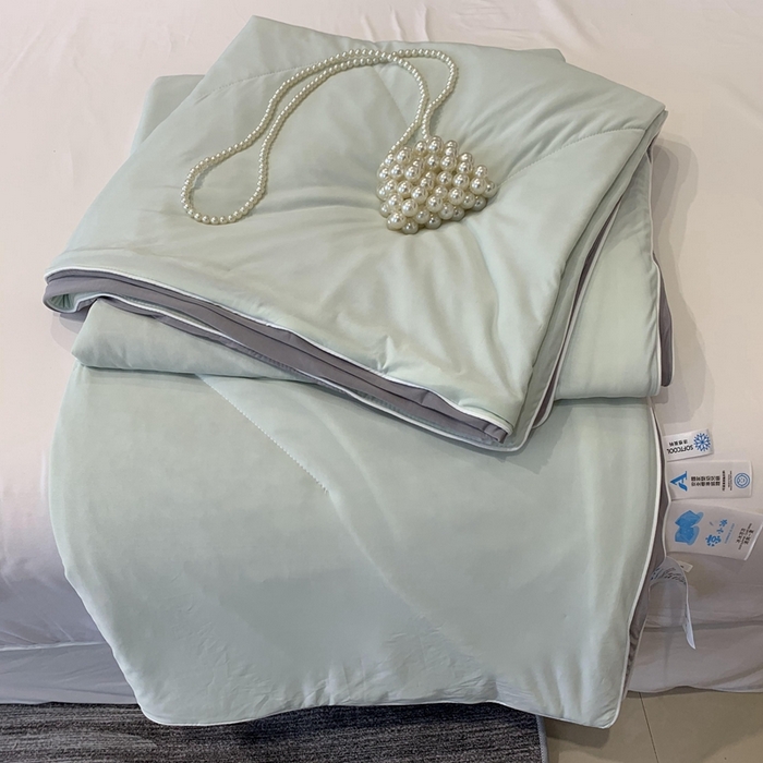 91家纺网 家纺一手货源 找家纺 奈萝家纺 2025新款A类凉感丝小凉皮夏被可机洗夏被新品空调被 香草奶冻