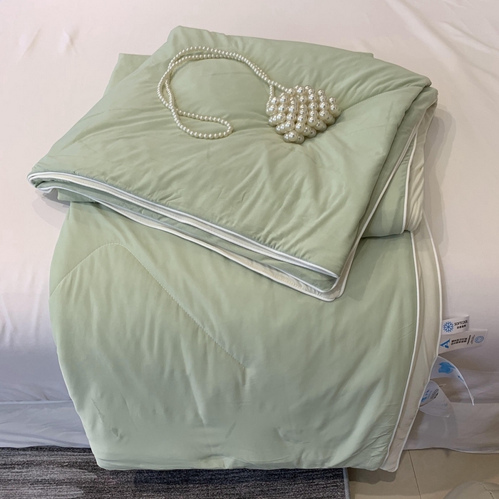 91家纺网 家纺一手货源 找家纺 奈萝家纺 2025新款A类凉感丝小凉皮夏被可机洗夏被新品空调被 薄荷奶绿