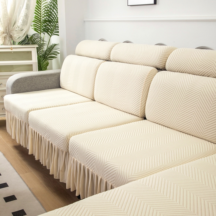 91家纺网 家纺一手货源 找家纺 千彤 2024新款裙边款弹力沙发套罩拉花绒人字纹系列沙发笠 米黄