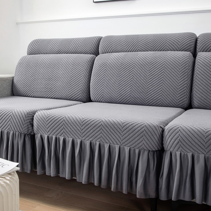 91家纺网 家纺一手货源 找家纺 千彤 2024新款裙边款弹力沙发套罩拉花绒人字纹系列沙发笠 深灰