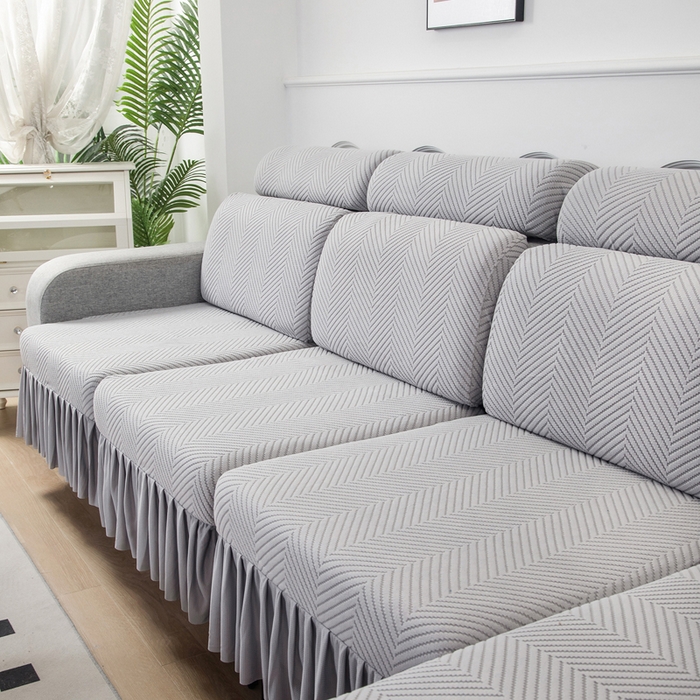 91家纺网 家纺一手货源 找家纺 千彤 2024新款裙边款弹力沙发套罩拉花绒人字纹系列沙发笠 银灰