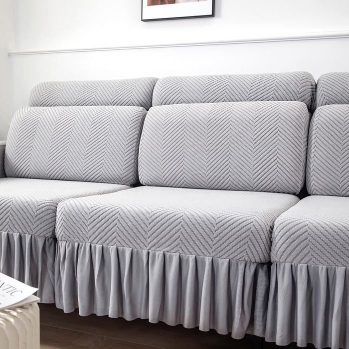 91家纺网 家纺一手货源 找家纺 千彤 2024新款裙边款弹力沙发套罩拉花绒人字纹系列沙发笠 银灰