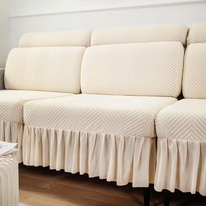 91家纺网 家纺一手货源 找家纺 千彤 2024新款裙边款弹力沙发套罩拉花绒人字纹系列沙发笠 米黄