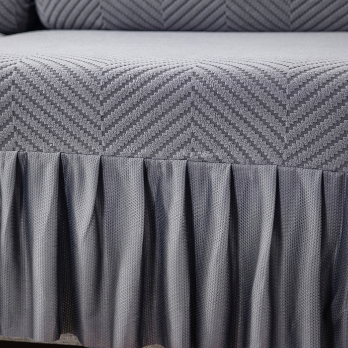 91家纺网 家纺一手货源 找家纺 千彤 2024新款裙边款弹力沙发套罩拉花绒人字纹系列沙发笠 深灰