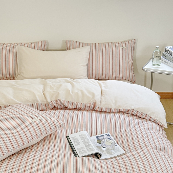 91家纺网 家纺一手货源 找家纺 玛奇朵 新款全棉色织立体提花四件套-海街日记 海街日记-粉橘（搭配米色床单）场景二