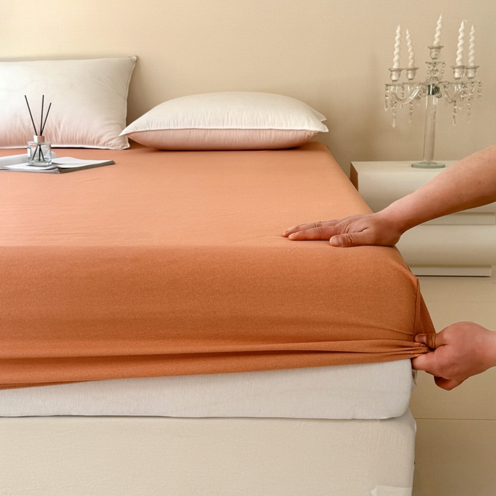 91家纺网 家纺一手货源 找家纺 艾迪尚家纺 2025新款纯色生态磨毛绣花单床笠 幸福树-桔黄