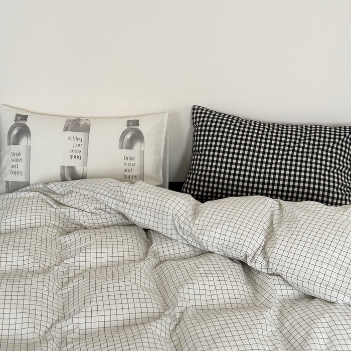 91家纺网 家纺一手货源 找家纺 艾沁家纺 2024新款黑白简约风全棉色织水洗棉四件套  小白格