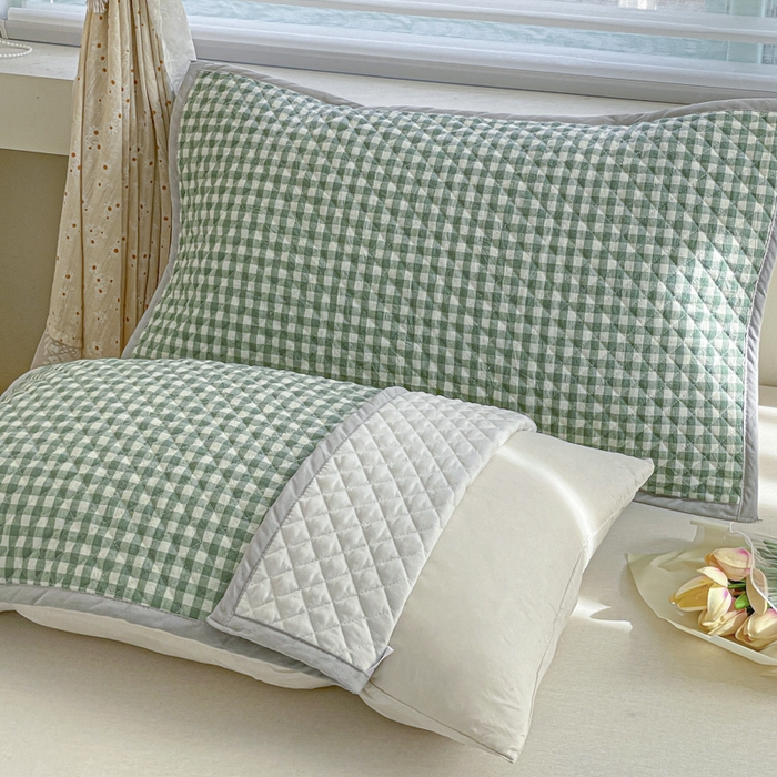 91家纺网 家纺一手货源 找家纺 爱港 2024全棉水洗色织绗缝绑带枕巾加厚夹棉隔脏防滑枕巾80*50cm布莱格-绿