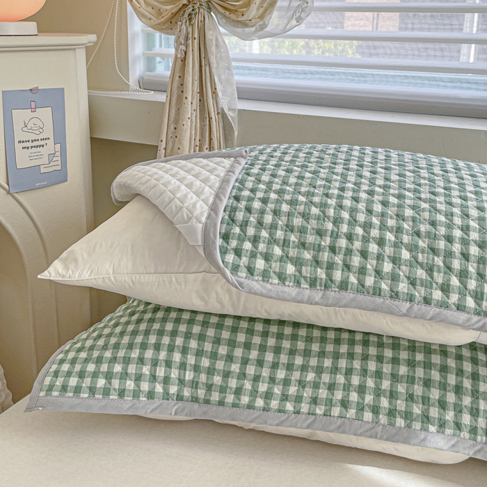 91家纺网 家纺一手货源 找家纺 爱港 2024全棉水洗色织绗缝绑带枕巾加厚夹棉隔脏防滑枕巾80*50cm布莱格-绿