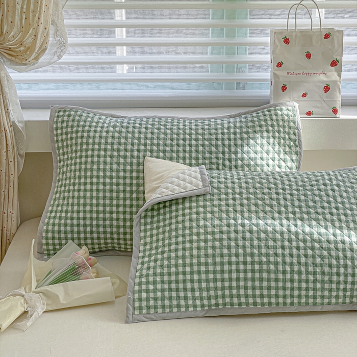 91家纺网 家纺一手货源 找家纺 爱港 2024全棉水洗色织绗缝绑带枕巾加厚夹棉隔脏防滑枕巾80*50cm布莱格-绿