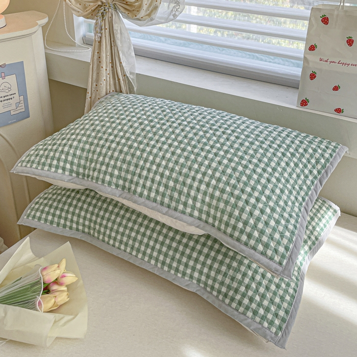 91家纺网 家纺一手货源 找家纺 爱港 2024全棉水洗色织绗缝绑带枕巾加厚夹棉隔脏防滑枕巾80*50cm布莱格-绿