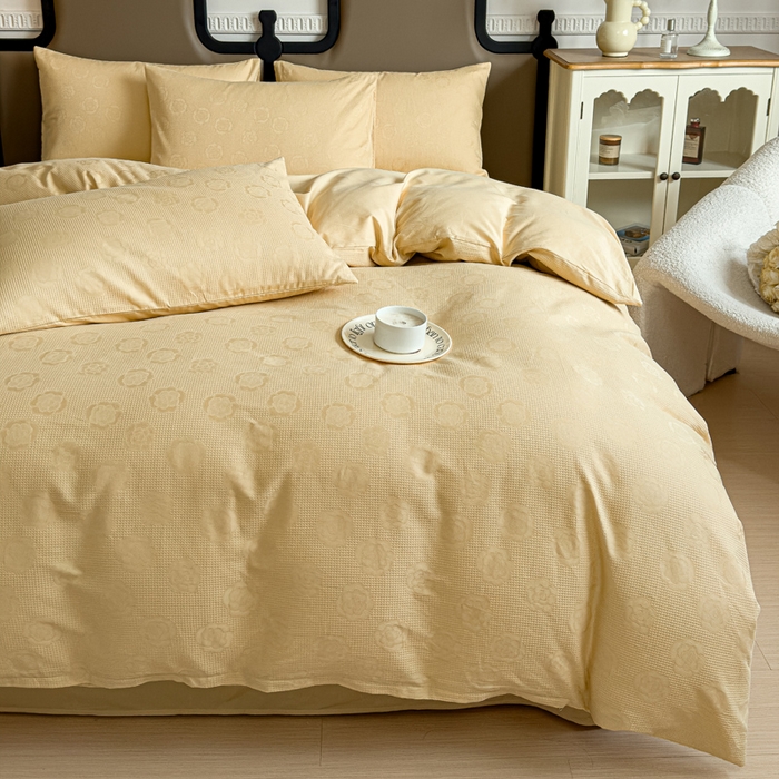 91家纺网 家纺一手货源 找家纺 金丝鸟家纺 2024新款棉水洗棉纯色提花四件套 山茶花 姜黄