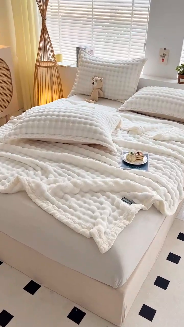 91家纺网 家纺一手货源 找家纺 芸锦豪 2024新款仿兔毛泡泡绒毛毯-包边款毛毯 米白-包边款