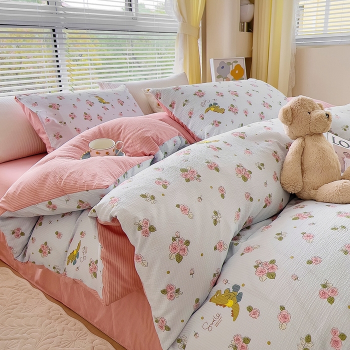 91家纺网 家纺一手货源 找家纺 氧家 2024新款水洗棉华夫格泡泡纱四件套 如梦花季粉