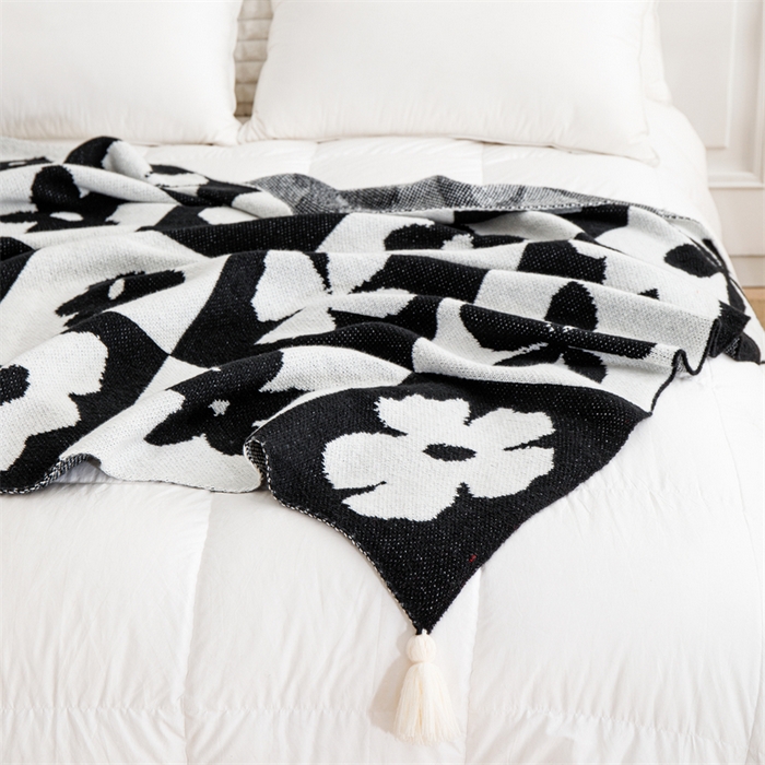 91家纺网 家纺一手货源 找家纺 苏艺针织盖毯 2024新款针织披肩沙发盖毯 针织-落花