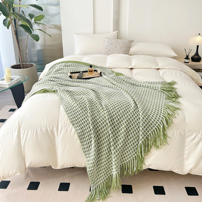 91家纺网 家纺一手货源 找家纺 苏艺针织盖毯 2024新款针织流苏华夫格毛毯 牛油果绿