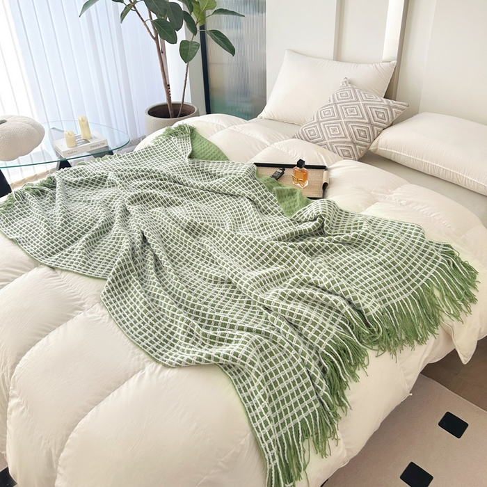 91家纺网 家纺一手货源 找家纺 苏艺针织盖毯 2024新款针织流苏华夫格毛毯 牛油果绿