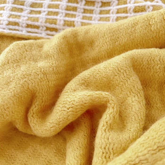 91家纺网 家纺一手货源 找家纺 苏艺针织盖毯 2024新款针织流苏华夫格毛毯 柠檬黄