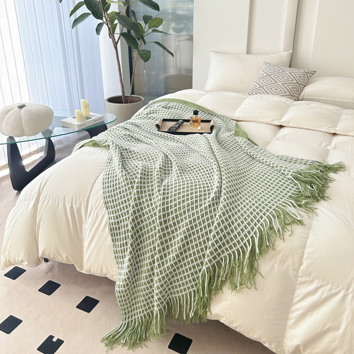 91家纺网 家纺一手货源 找家纺 苏艺针织盖毯 2024新款针织流苏华夫格毛毯 牛油果绿