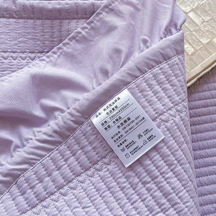 91家纺网 家纺一手货源 找家纺 紫碧螺家纺 2024新款绣花欧式花边床盖（泡泡棉）   粉紫色