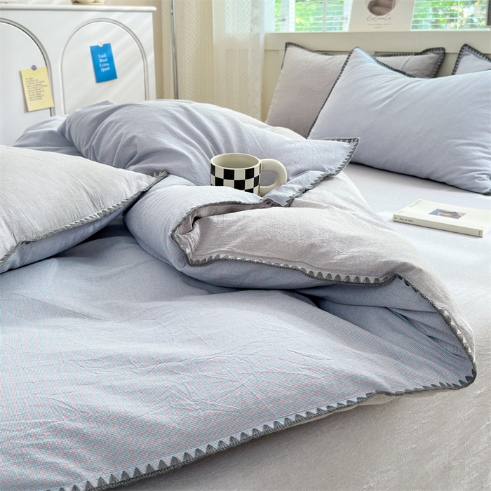 91家纺网 家纺一手货源 找家纺 宜家坊 2024新款A类全棉色织水洗棉贝壳边绣三角针工艺四件套可定制 星语-浅灰