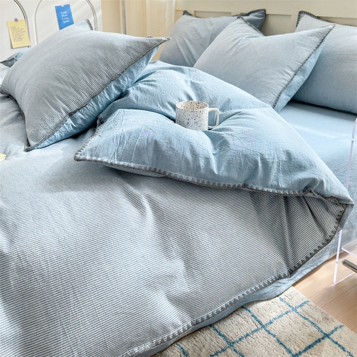 91家纺网 家纺一手货源 找家纺 宜家坊 2024新款A类全棉色织水洗棉贝壳边绣三角针工艺四件套可定制 时光-浅蓝