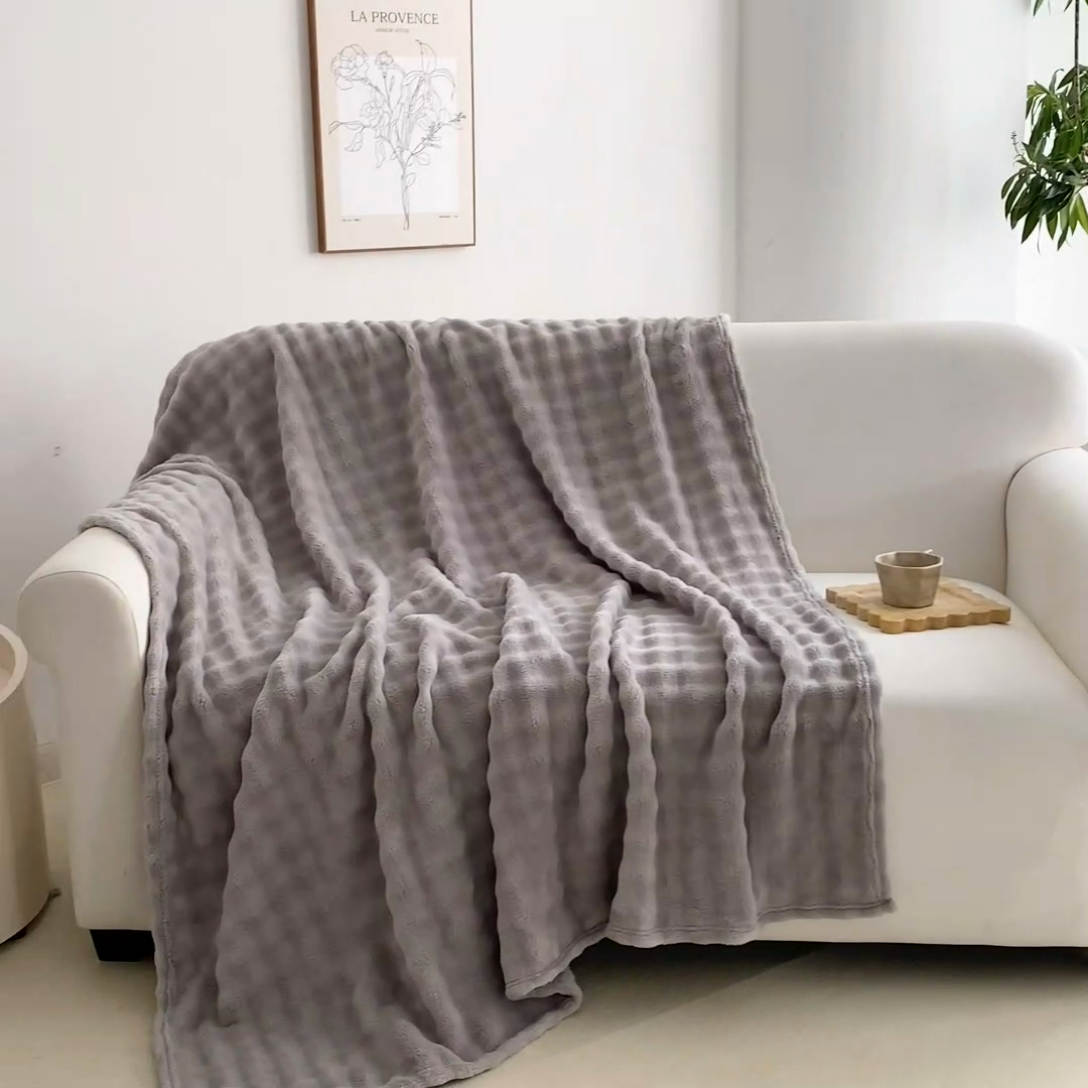 91家纺网 家纺一手货源 找家纺 巴木赫 2024新款法兰绒泡泡卷边毯子毛毯 银灰