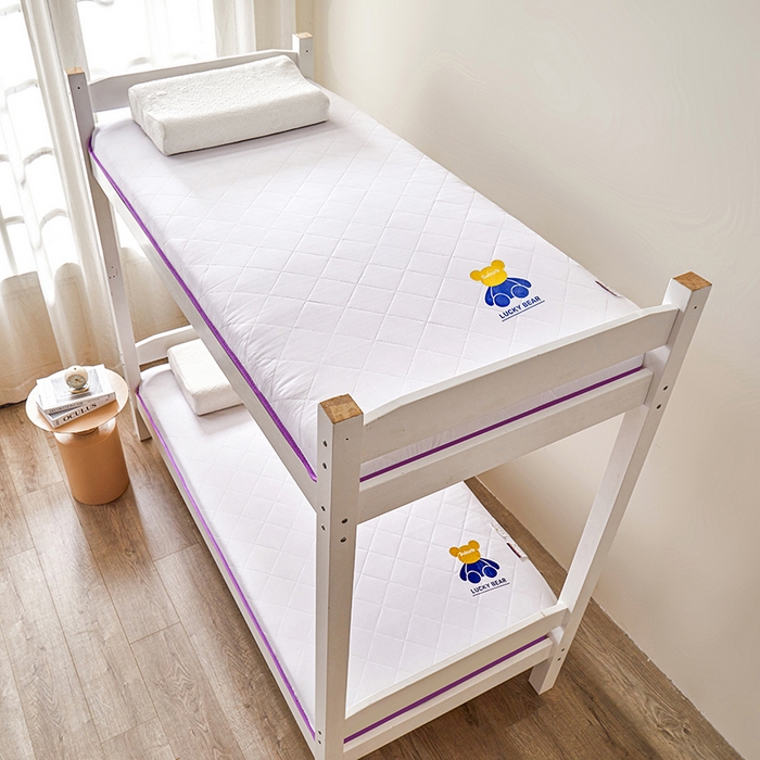 91家纺网 家纺一手货源 找家纺 瑶瑶家居床垫 2024新款水洗棉学生床垫 小熊白-紫边