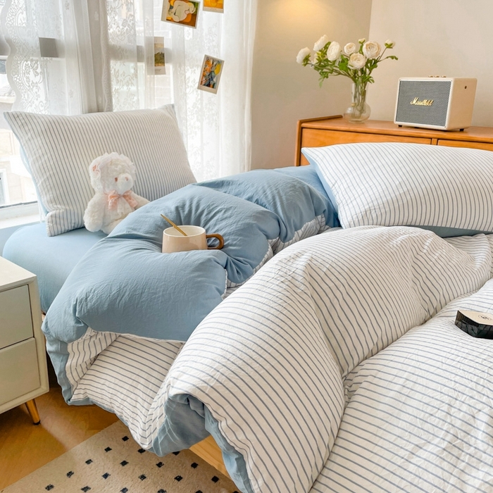 91家纺网 家纺一手货源 找家纺 悦织湾家纺 2025新款105克水洗棉磨毛四件套 良品条纹蓝