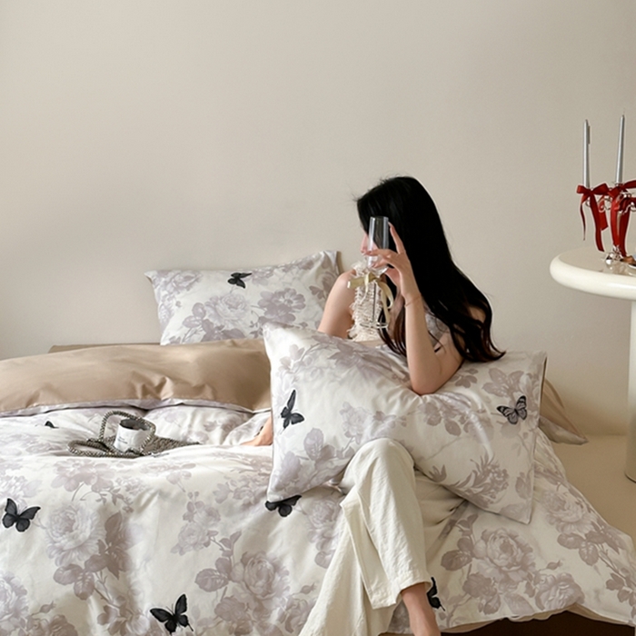 91家纺网 家纺一手货源 找家纺 昔可 2024新款全棉蝴蝶印花系列四件套 模特图 水墨画黑蝴蝶