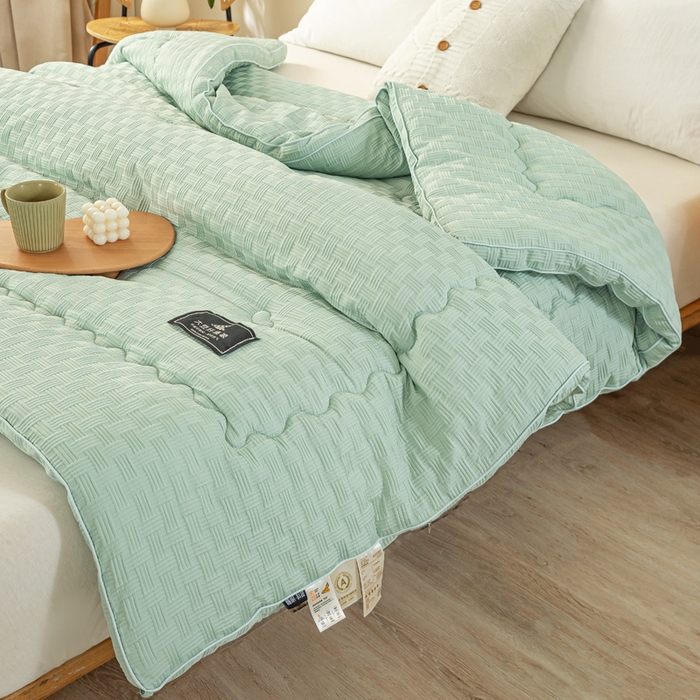91家纺网 家纺一手货源 找家纺 居易简 2025秋冬新款直播华夫格大豆被冬被立体包边订棉工艺水洗棉大豆被 清新绿