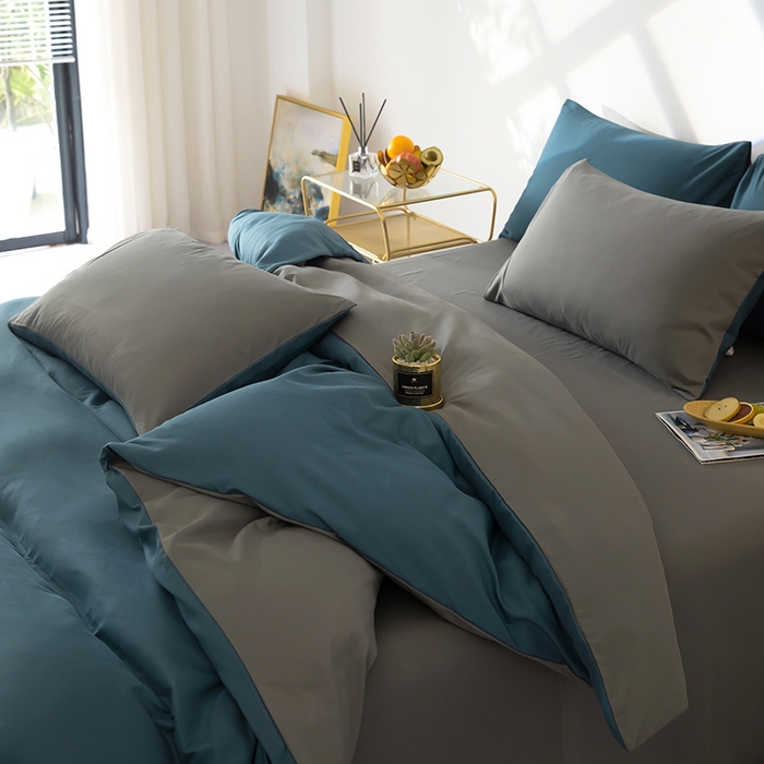 91家纺网 家纺一手货源 找家纺 梦莱家纺 2024新款亲肤磨毛纯色拼色轻奢系列四件套 深蓝+深灰