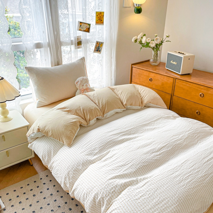 91家纺网 家纺一手货源 找家纺 悦织湾家纺 2025新款水洗棉纯色条纹小眼睛学生宿舍三件套 良品条纹驼