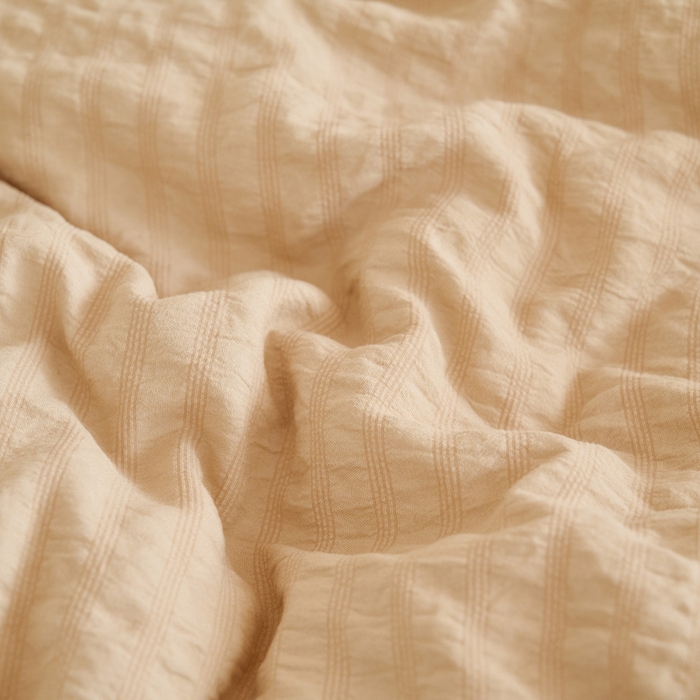 91家纺网 家纺一手货源 找家纺 子由家居 2024新款b类泡泡格7A抗菌学生季大豆被 泡泡学生被-驼色