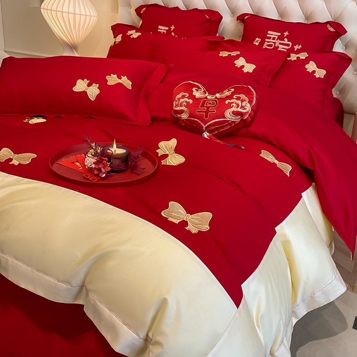 91家纺网 家纺一手货源 找家纺 玉雅家纺 2025新款60支长绒棉时尚拼色浮雕刺绣婚庆四件套 蝴蝶结-红