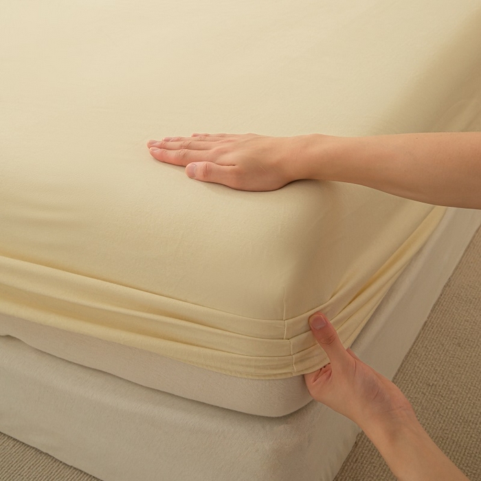 91家纺网 家纺一手货源 找家纺 涵宸家纺 2024新款原棉纯色织标磨毛单品及套件--床笠 单床笠-奶昔白