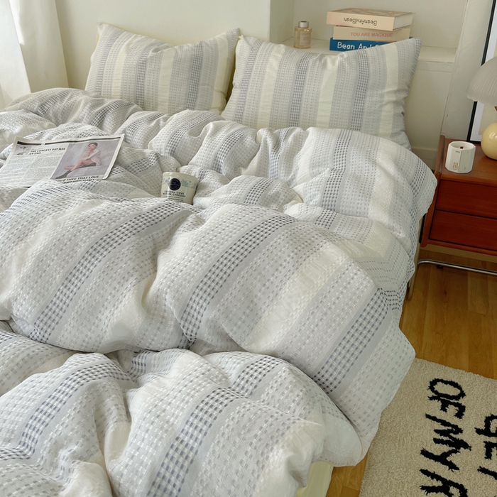 91家纺网 家纺一手货源 找家纺 轻奢坊 2024新款水洗棉渐变色提花华夫格四件套 渐变色华夫格-蓝黄