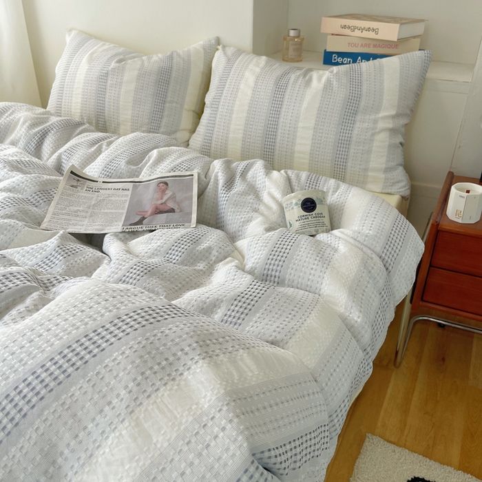 91家纺网 家纺一手货源 找家纺 轻奢坊 2024新款水洗棉渐变色提花华夫格四件套 渐变色华夫格-蓝黄