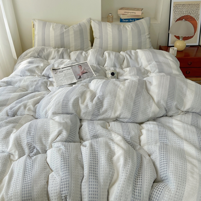 91家纺网 家纺一手货源 找家纺 轻奢坊 2024新款水洗棉渐变色提花华夫格四件套 渐变色华夫格-蓝黄