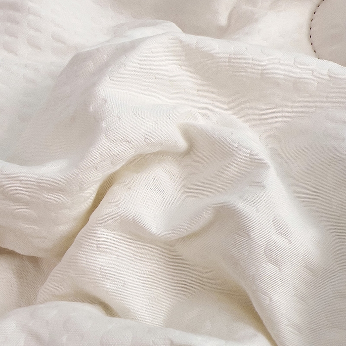 91家纺网 家纺一手货源 找家纺 暖阁 2025新款亲肤压泡豆豆羽丝被冬被春秋被被子被芯 奶白色