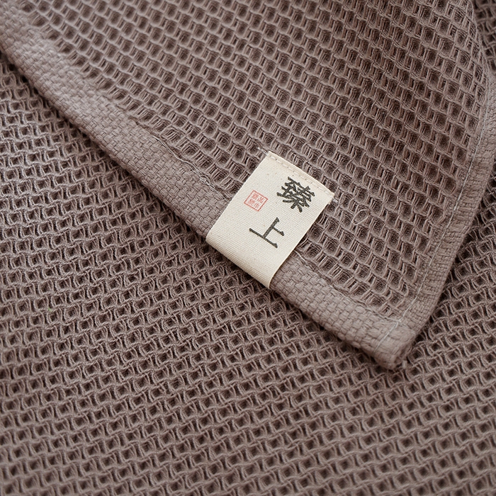 91家纺网 家纺一手货源 找家纺 2024新款北欧风素色布标全棉蜂窝华夫格透气枕巾52*78cm一对 北欧风-咖